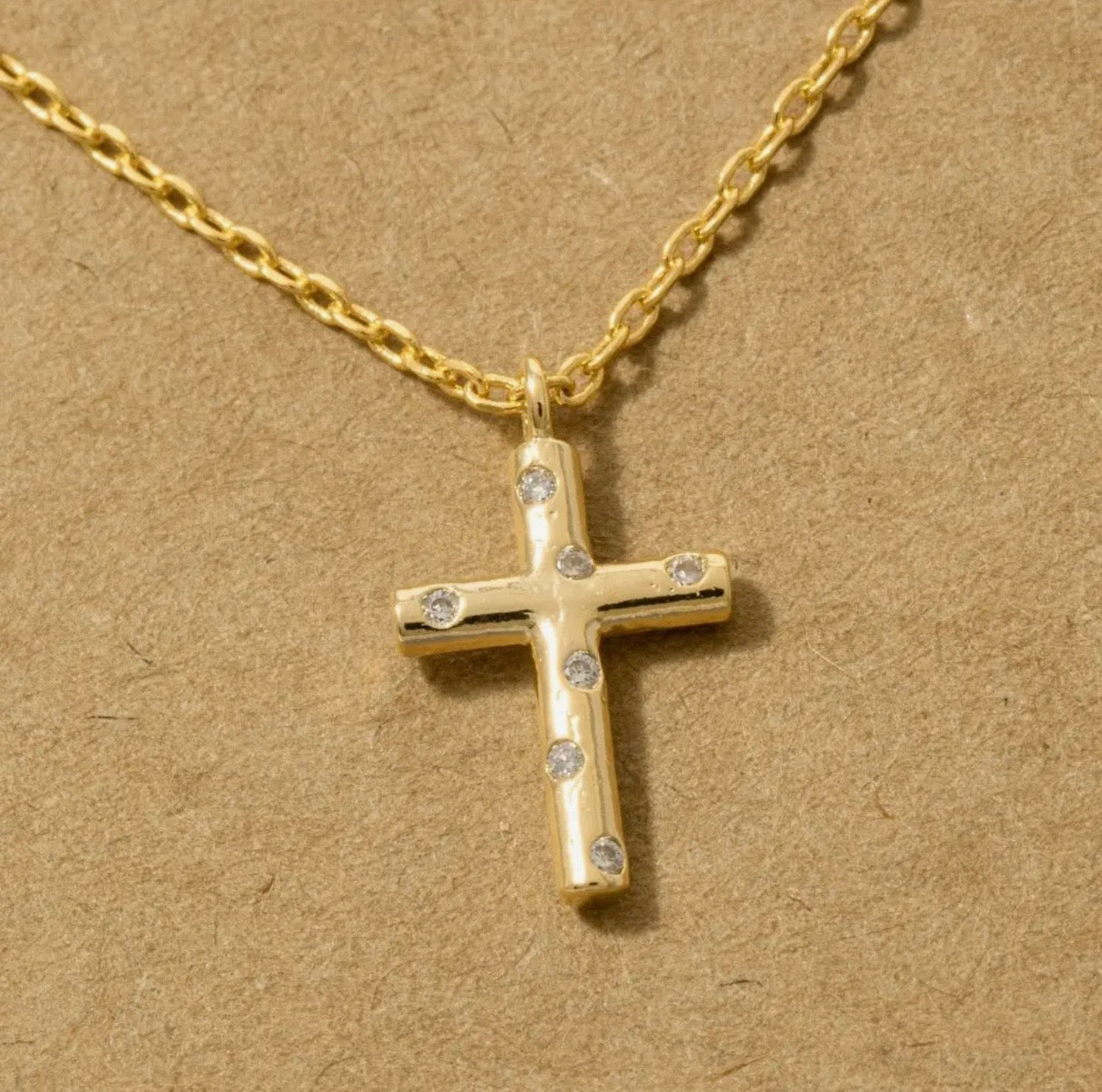 Studded cross pendant