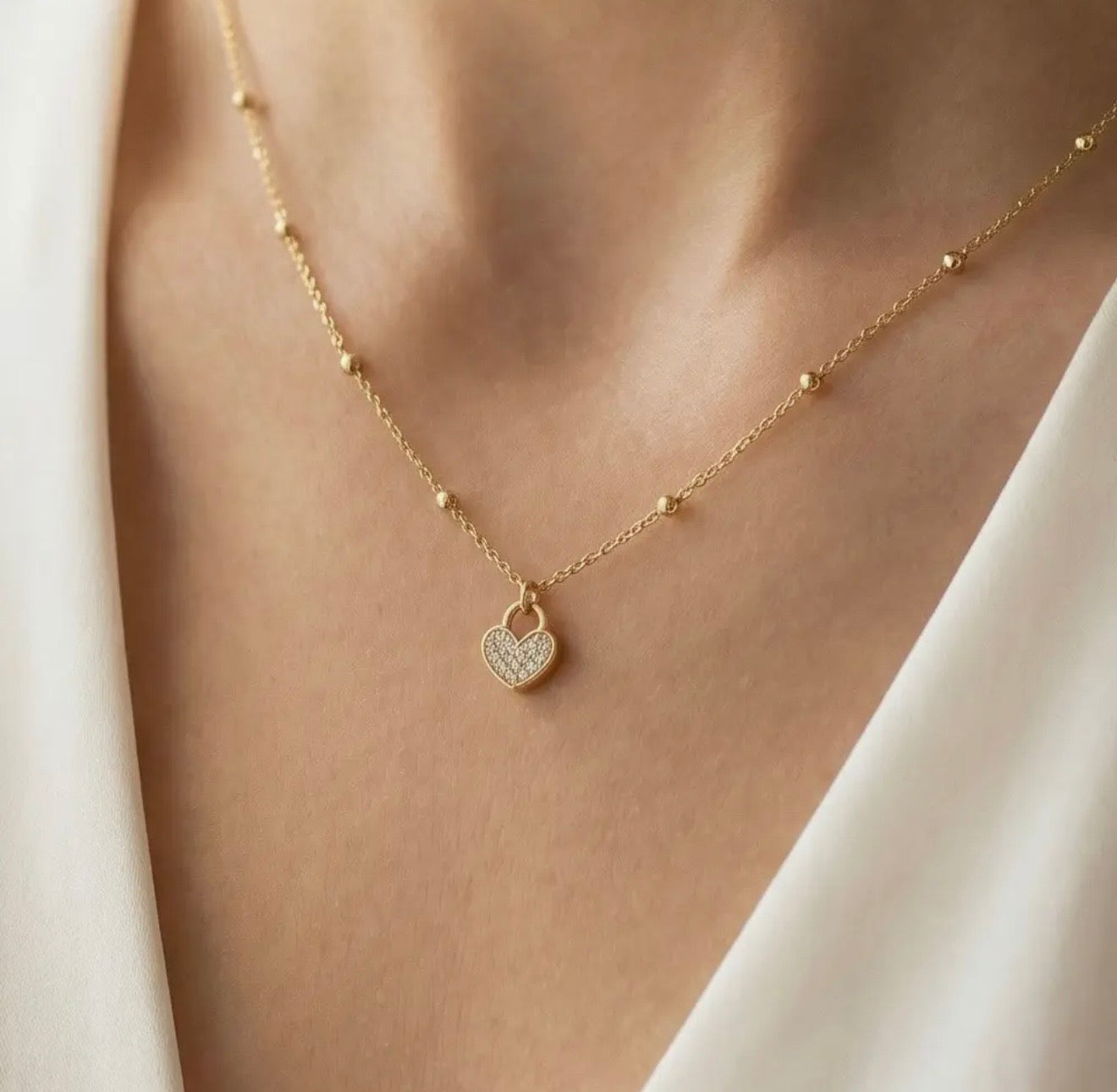 Pave heart lock pendant